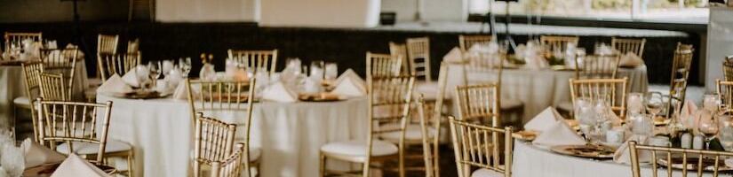 Auditorium set up for formal dinner event