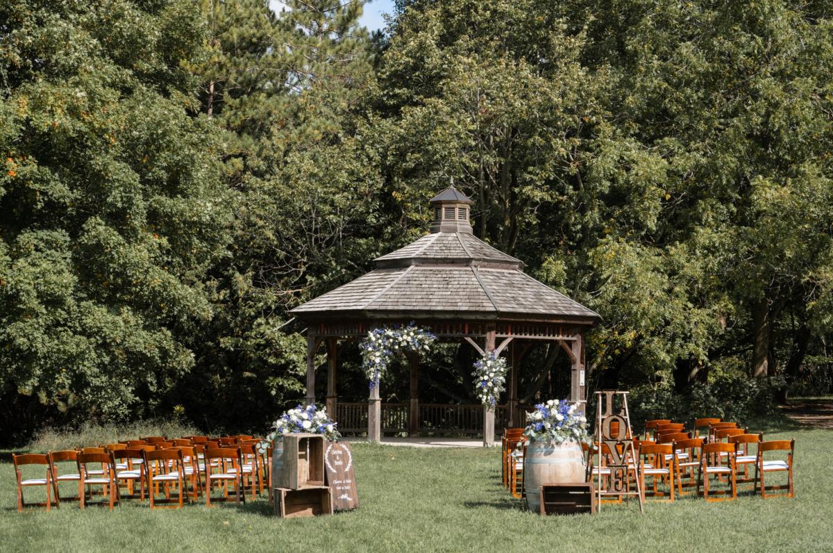 The Arboretum west lawn gazebo wedding setup in the summer 
